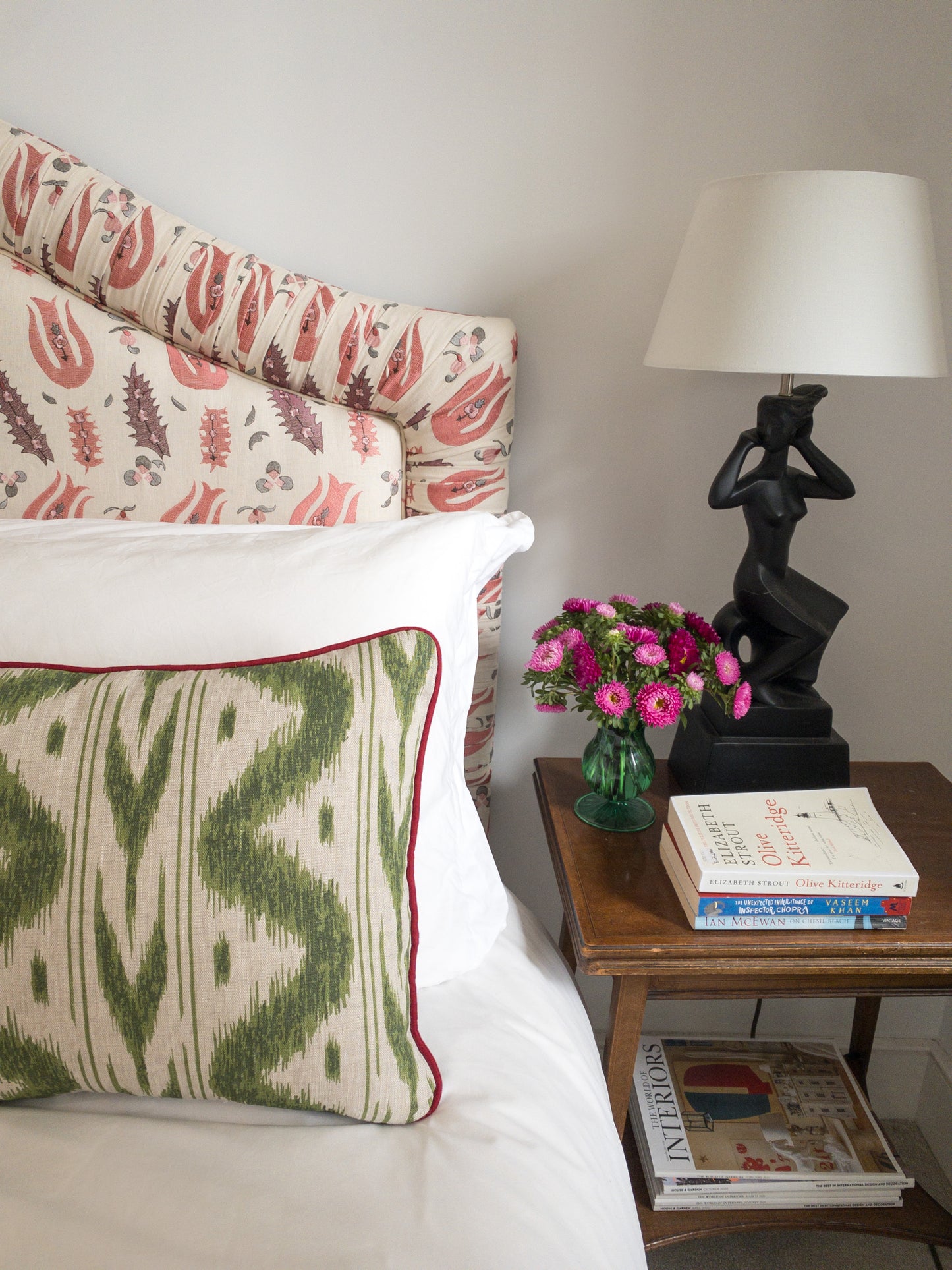 Green geo + red piping Cushion