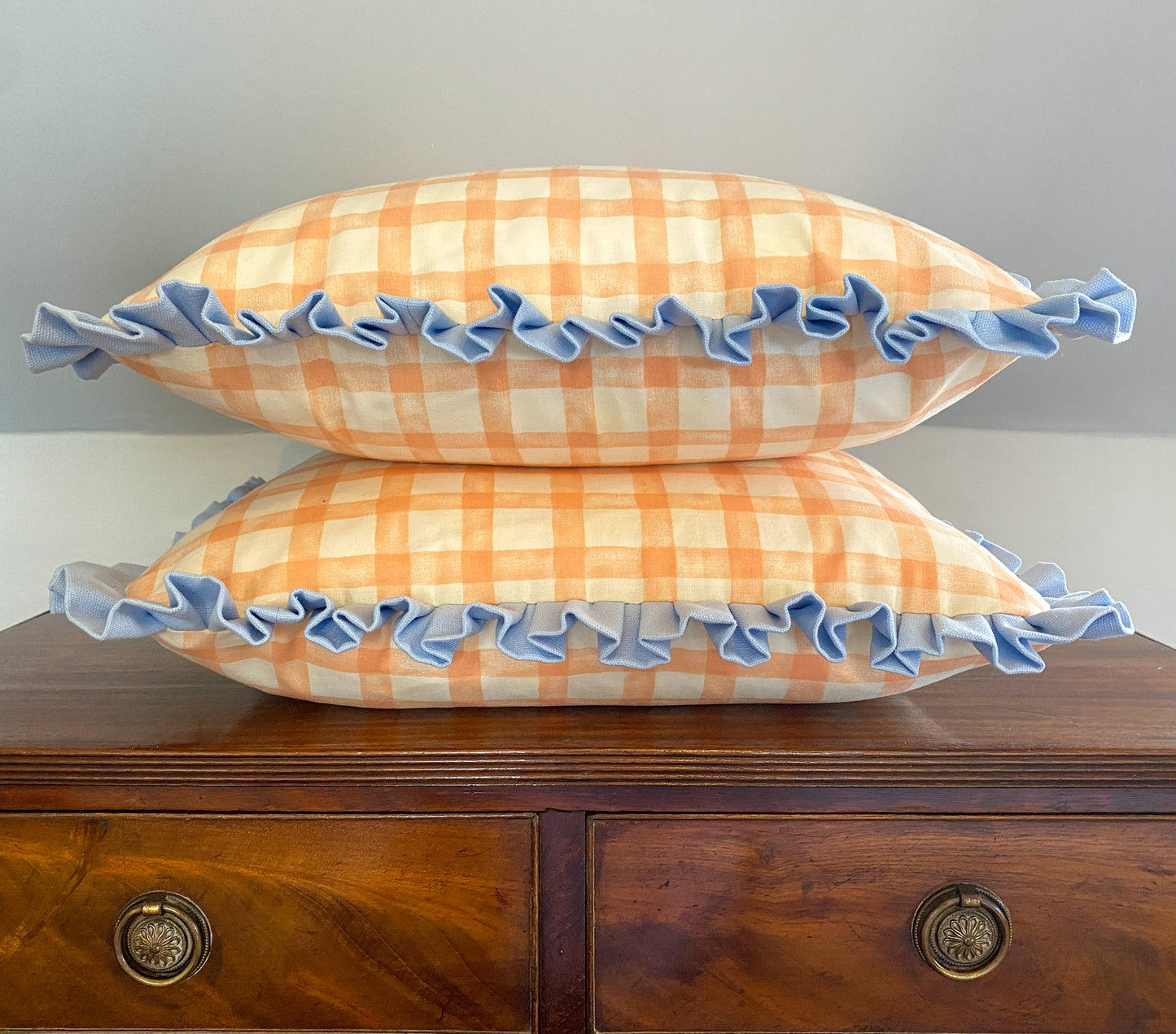 Peach gingham with pale blue frill Cushion
