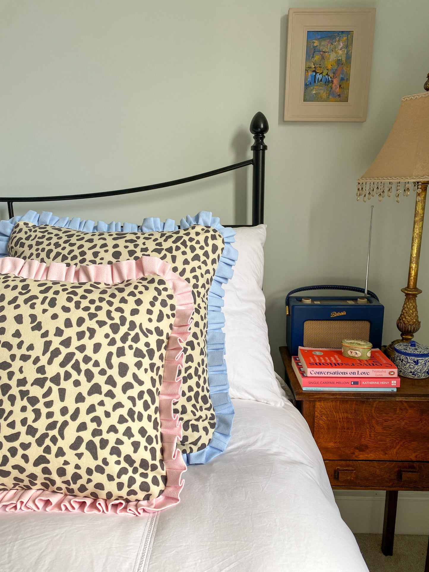 Black spots with pale pink frill Cushion