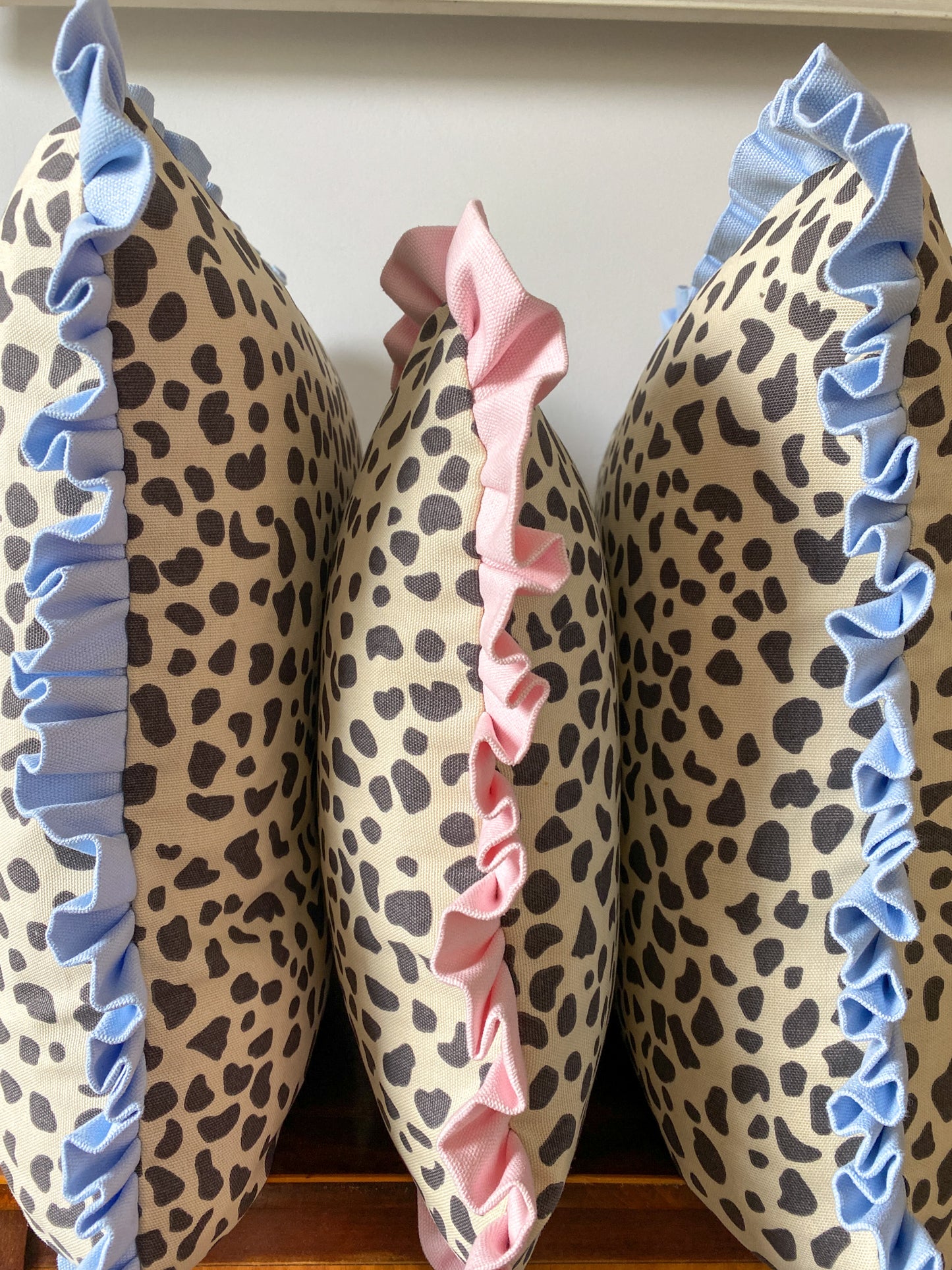 Black spots with pale pink frill Cushion